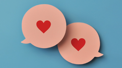 Conversation bubbles with hearts in them on a blue background